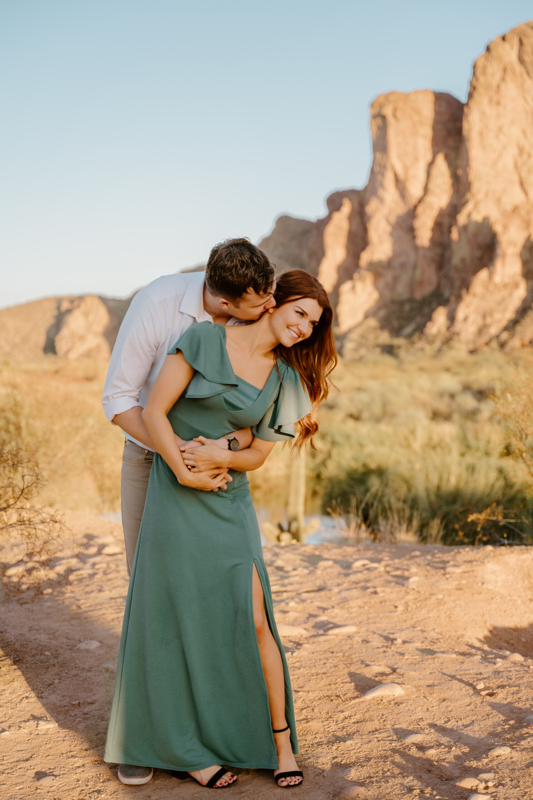 Couple embracing as they laugh together at Lower Salt River