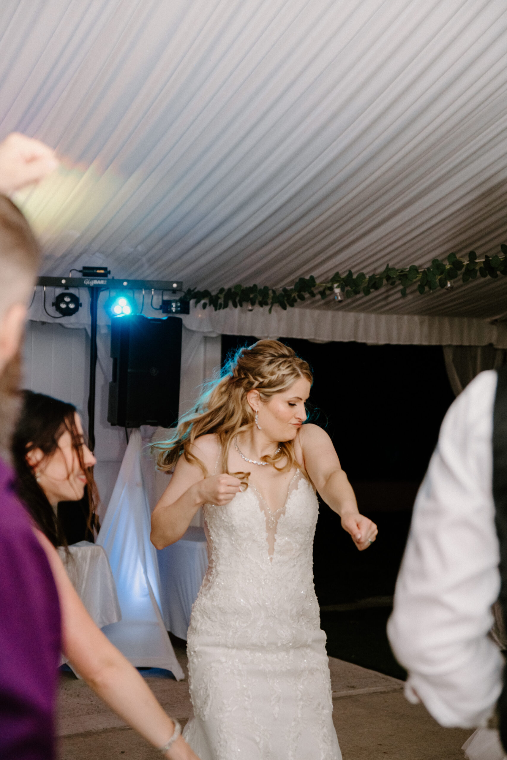 Bride dancing on the dance floor during her reception