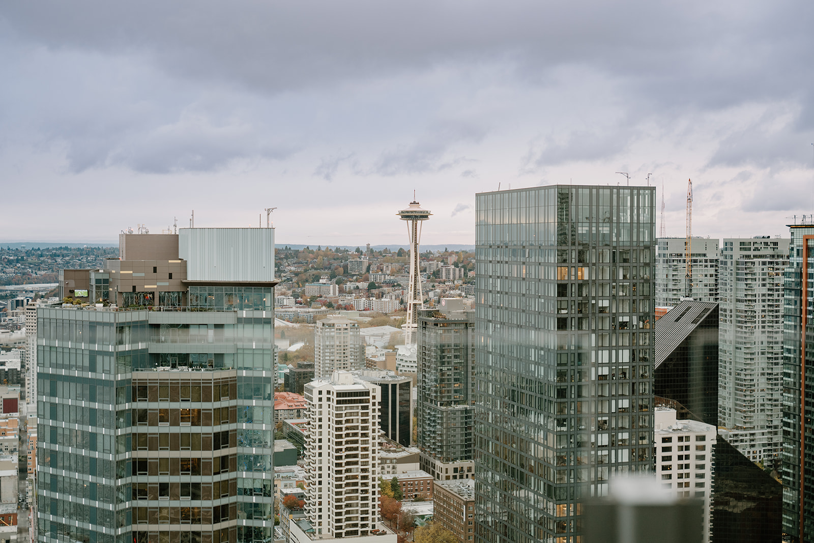 A skyline view at the after party overlooking the Seattle space needle on a rainy and cloudy day