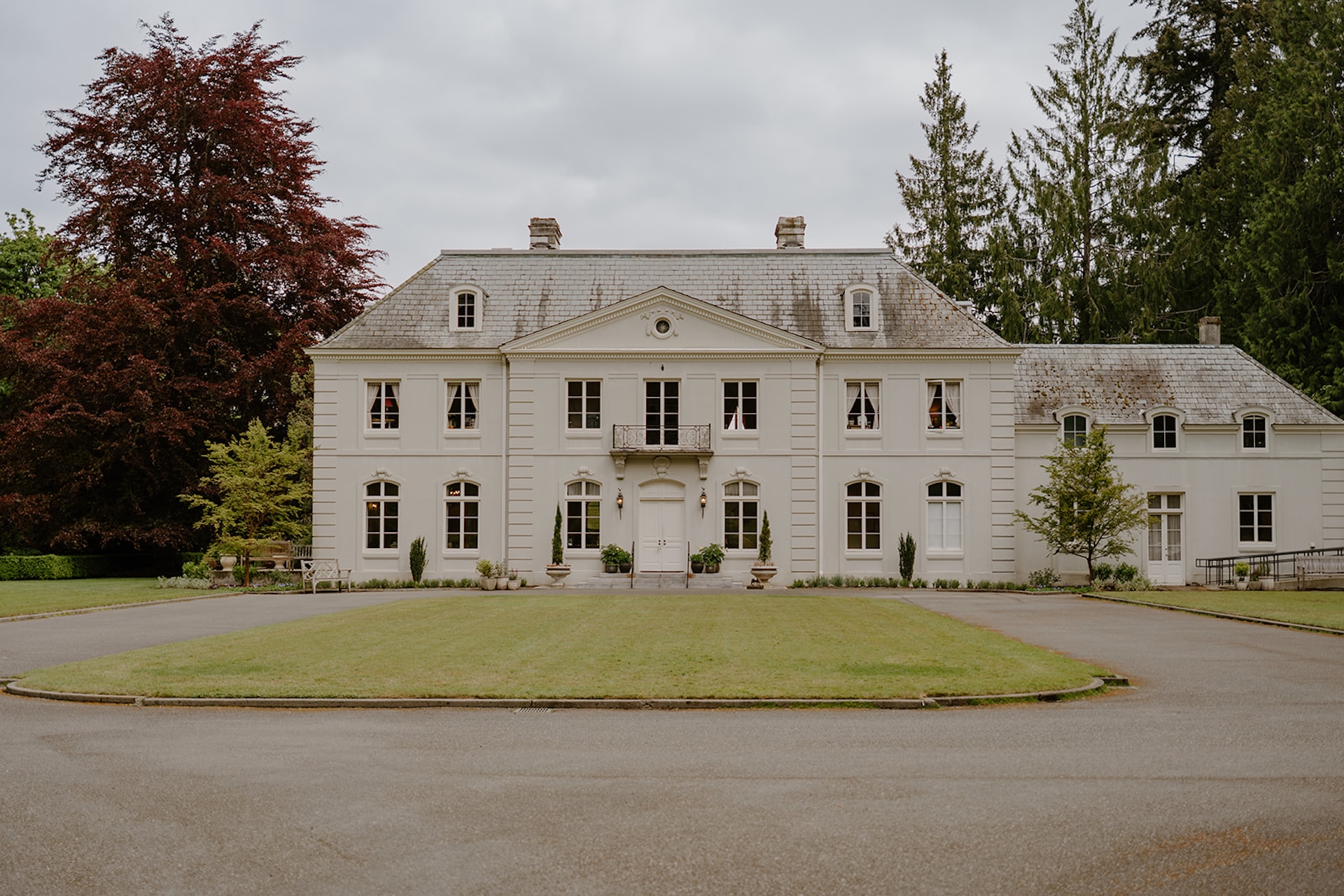 Wide shot of the historical white building at Bloedel Reserve in Washington